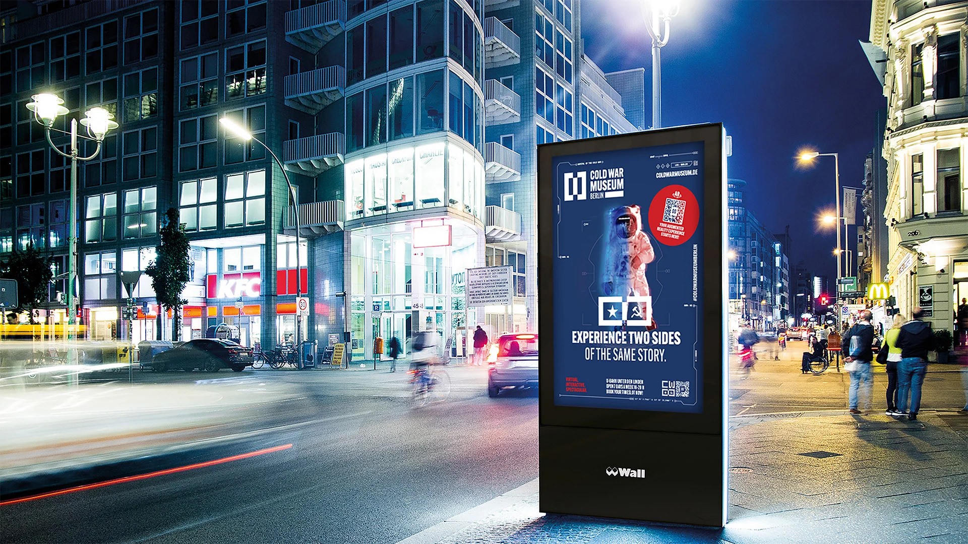 One picture shows a poster of the Cold War Museum in Berlin at a bus stop.