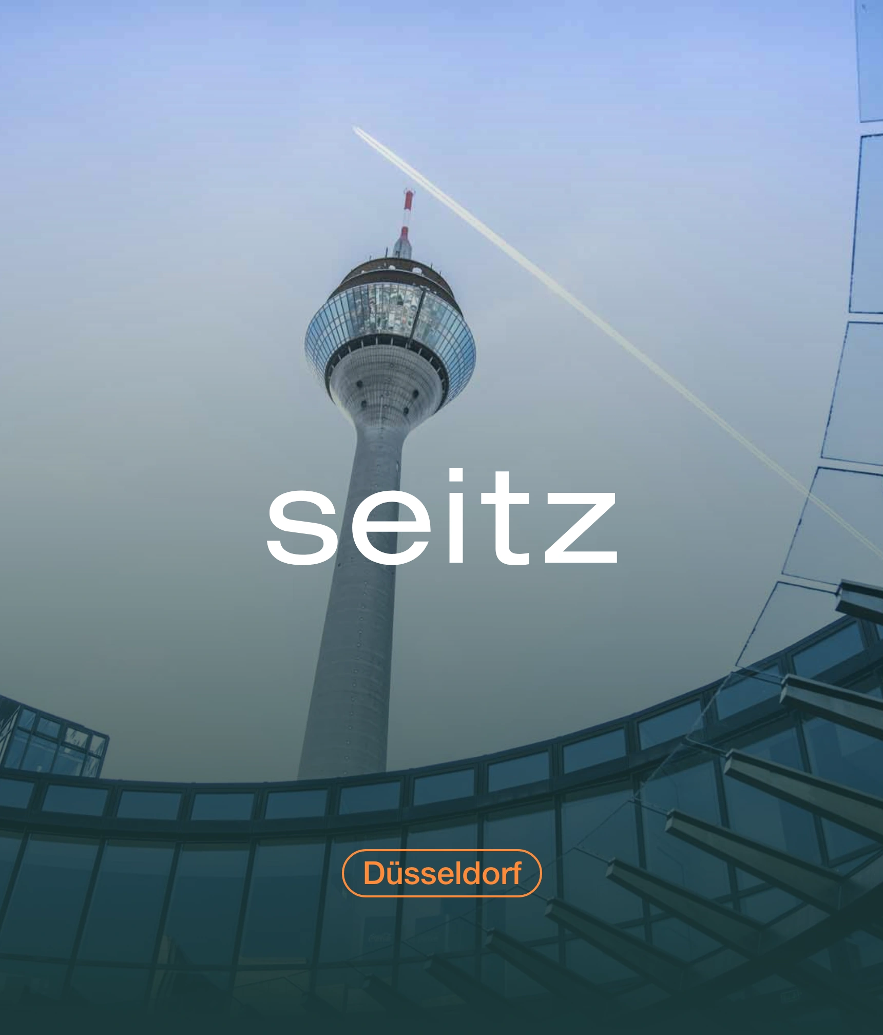 One picture shows the Rheinturm in Düsseldorf and the Seitz logo in the front.